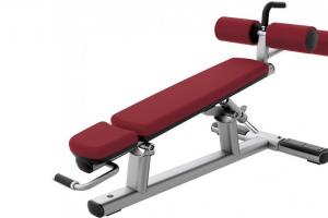 Twisting on an incline bench - a basic exercise for the abdominal muscles
