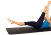 Pilates for beginners at home Leg raises with hip flexion and pulses